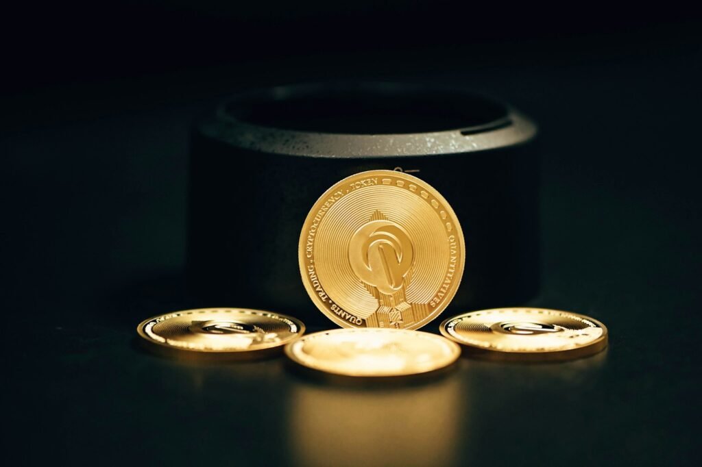 a gold coin sitting on top of a black table